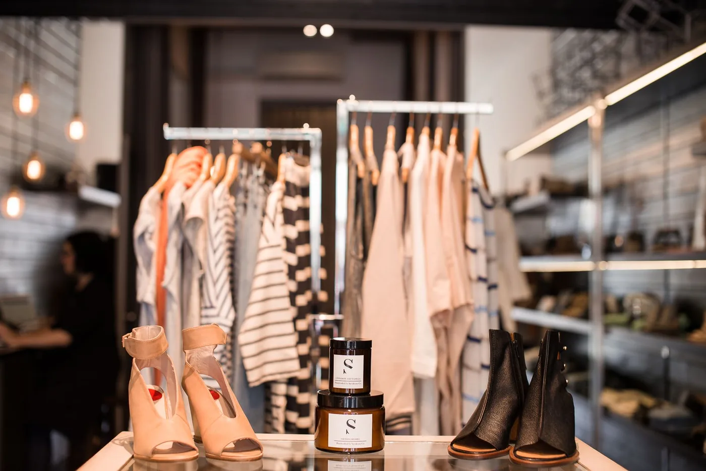 Clean modern retail clothing store with polished floors and neat displays